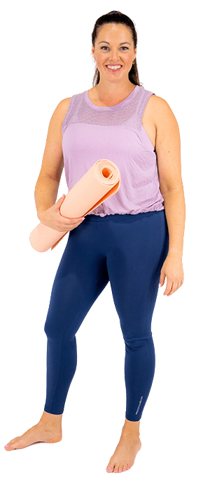 Physio Mel Platt in training wear holding a yoga mat