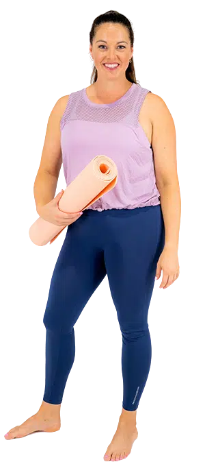Physio Mel Platt in training wear holding a yoga mat