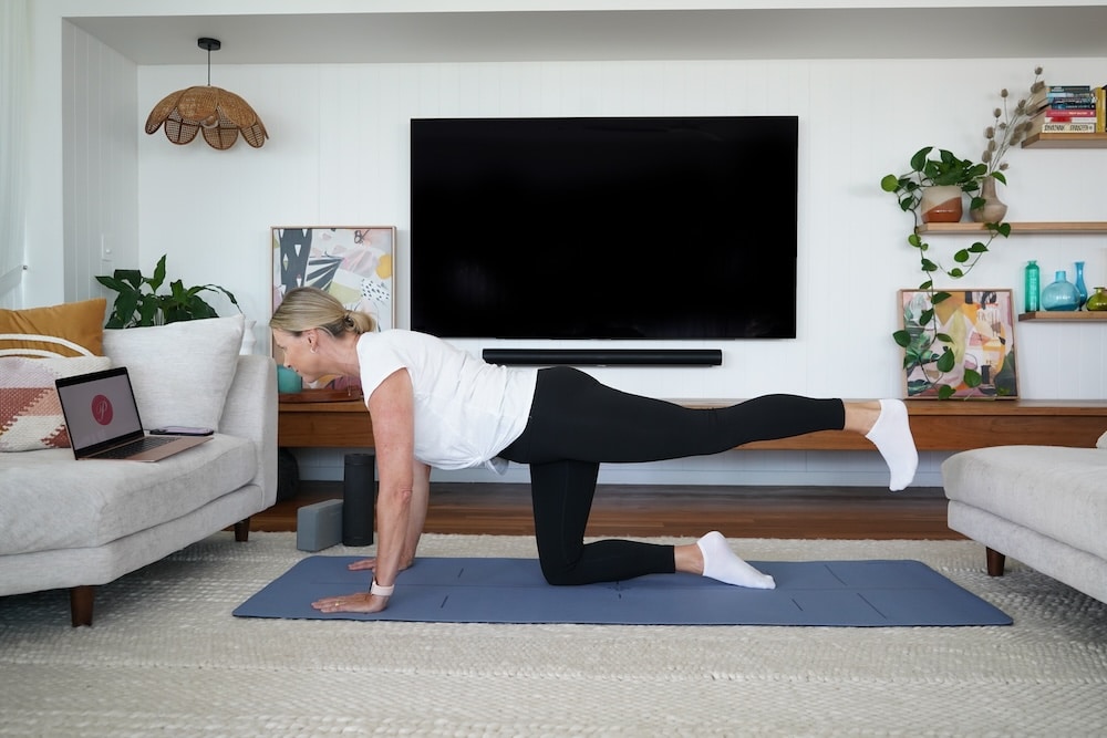 Woman exercising her core and buttock muscles